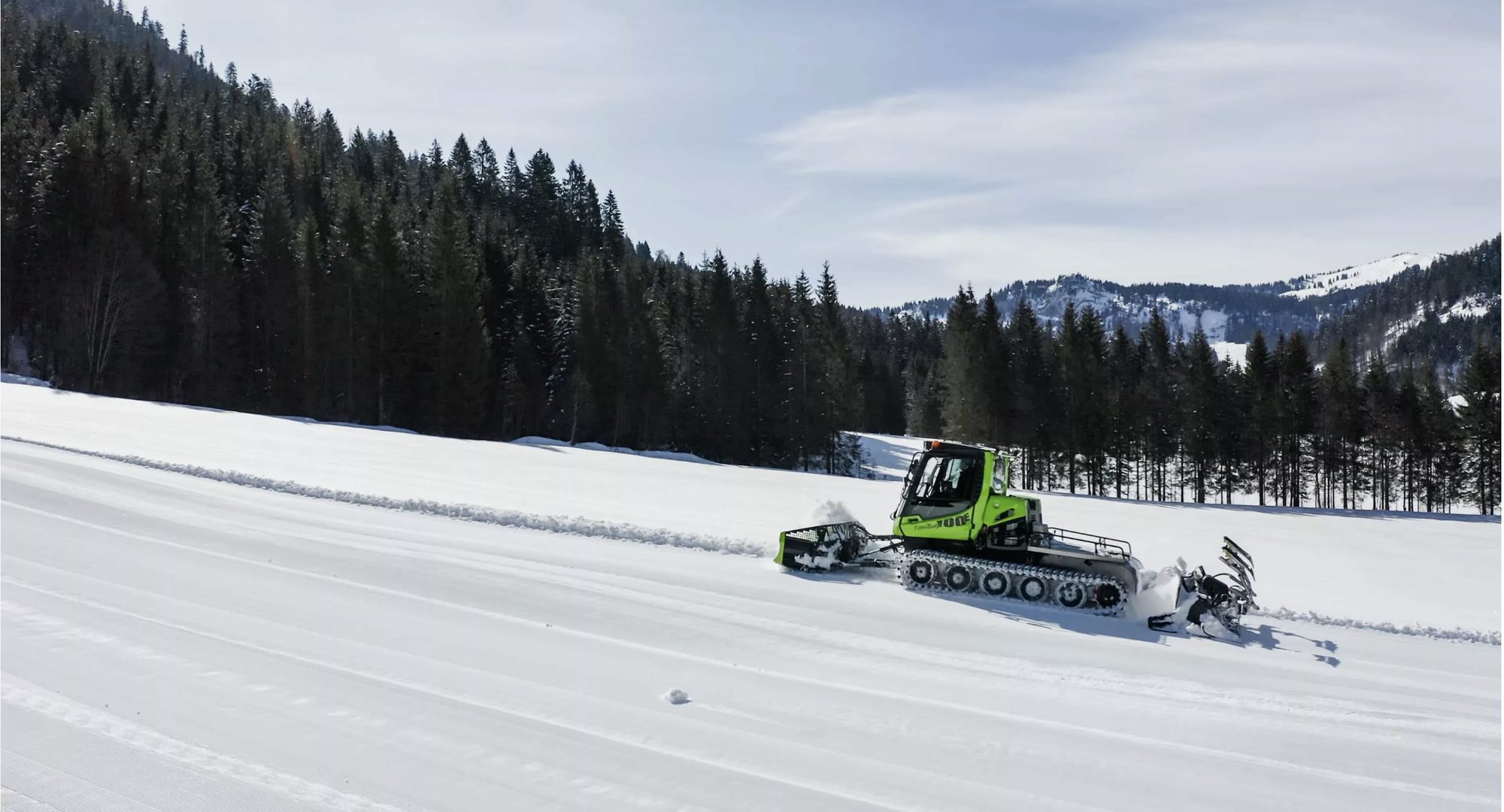 PistenBully 100E electric compact groomer