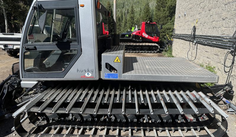 2010 Prinoth Husky with 8-person passenger cabin full