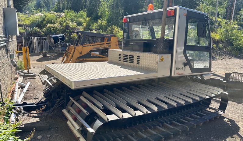 2010 Prinoth Husky with 8-person passenger cabin full