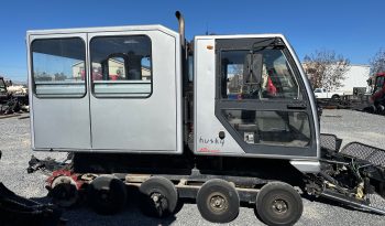 2010 Prinoth Husky with 8-person passenger cabin full