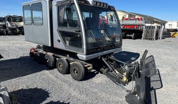 2010 Prinoth Husky with 8-person passenger cabin full